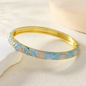Elegant Gold and Blue Floral Bangle